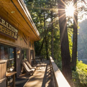 The beautiful deck of Paradise Lodge, one of our gorgeous locations along the Rogue River.