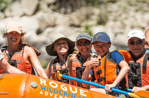 happy guests rafting on rogue river