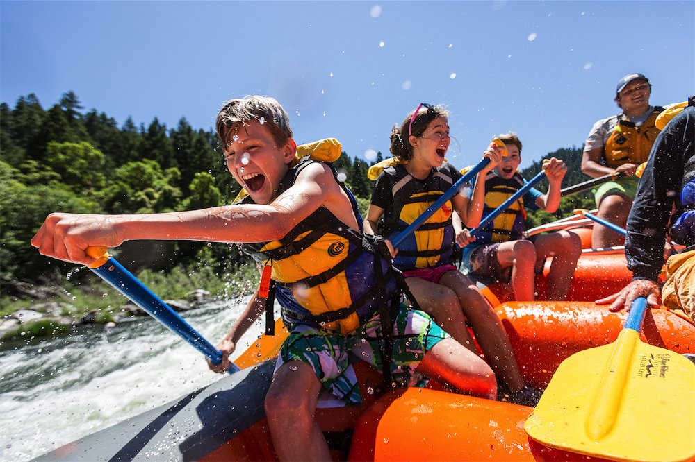 Kids having fun rafting on the Rogue River